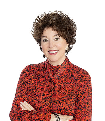 Portrait of Mitzi Gill, REALTOR®.